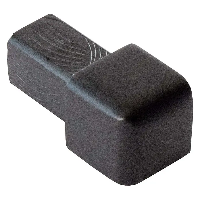 Dalsys Quadroprofil 8mm Endstück Quadratprofil Alu Schwarz, eloxiert - Aluminium, Schwarz - Dunkelgraue, rechteckige Kunststoff-Endkappe mit abgerundeter Vorderseite und texturierter Oberfläche.