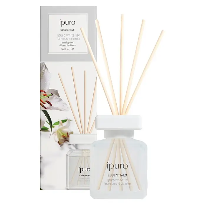 Ipuro Essentials Raumduft - White Lily, 100 ml - ipuro Raumduft-Diffusor 'White Lily' in transparentem Flakon mit Holzstäbchen und Verpackung.