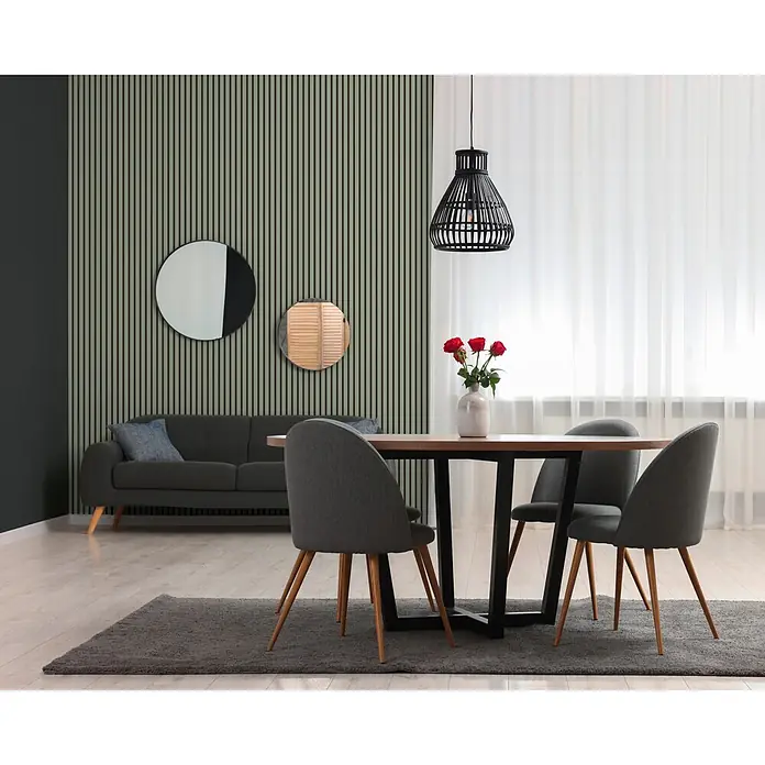 A.S. Création Pintwalls 3 Vliestapete Paneele - Grün-Schwarz, Sonstiges, 10,05 x 0,53 m - Modernes Esszimmer mit rundem Holztisch, schwarzen Beinen und vier grauen Polsterstühlen auf Teppich.