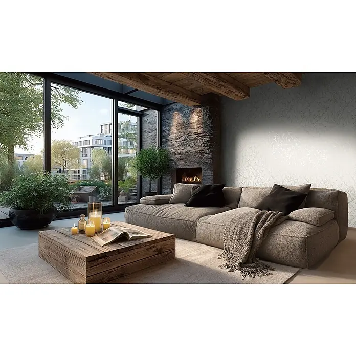 A.S. Création Metropolitan Stories Vibes & Styles Vliestapete Gräser I - Creme-Grün, Floral, 10,05 x 0,53 m - Helle Tapete mit botanischem Muster an der Wand eines modernen Wohnzimmers, ergänzt durch natürliches Licht.