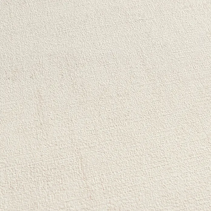 A.S. Création Cuba 2 Vliestapete Uni - Beige-Creme, Uni, 10,05 x 0,53 m - Nahaufnahme einer cremefarbenen, fein texturierten Oberfläche mit subtiler Körnchenstruktur.