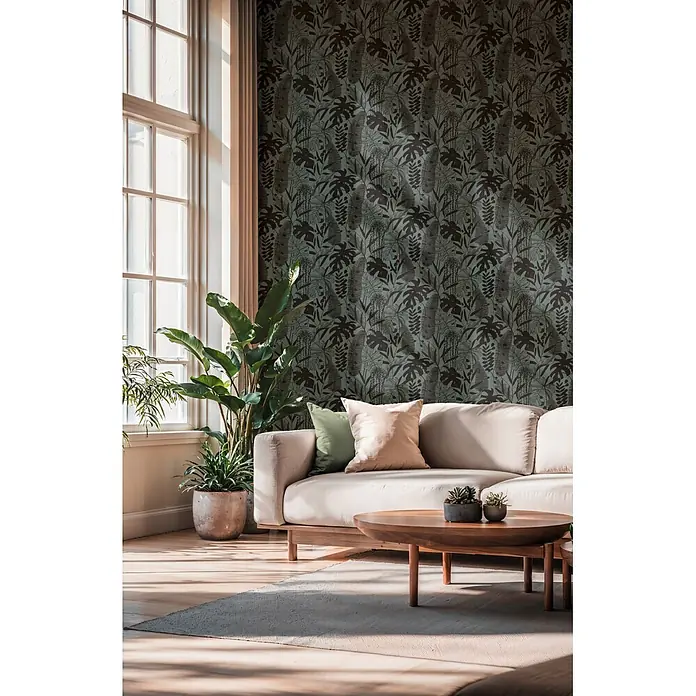 A.S. Création Cuba 2 Vliestapete Blätter - Blau-Schwarz, Floral, 10,05 x 0,53 m - Dunkle petrolfarbene Dschungel-Tapete mit großen tropischen Blättern, die eine Akzentwand in einem hellen Wohnzimmer bildet.