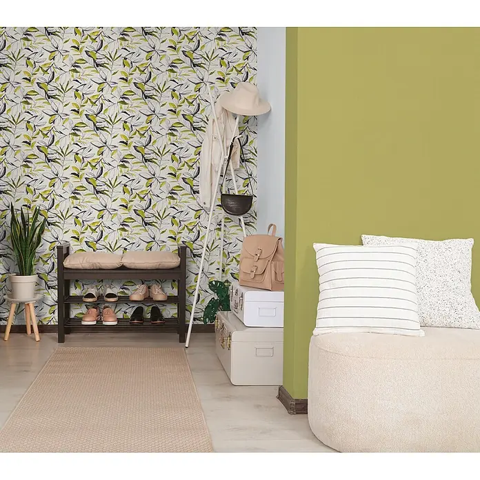 A.S. Création Pintwalls 3 Vliestapete Blätter - Grün-Schwarz, Floral, 10,05 x 0,53 m - Tapete mit grünem, schwarzem und weißem Blättermuster an einer Flurwand.