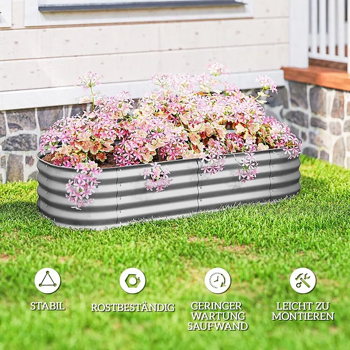Outsunny Hochbeet - Stahl, Silber - Silbernes, welliges Hochbeet aus Metall, gefüllt mit rosa Blumen.
