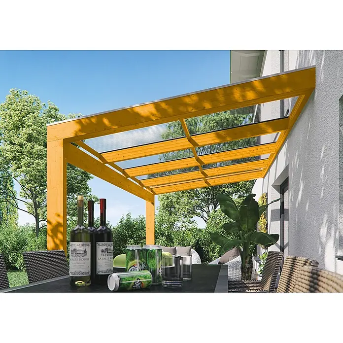 SKAN HOLZ Terrassenüberdachung Novara - B x T: 450 x 359 cm, Eiche hell, Polycarbonat, Transparent - Hölzerne Pergola mit transparentem Dach an einem Haus, das eine Terrasse überdacht.