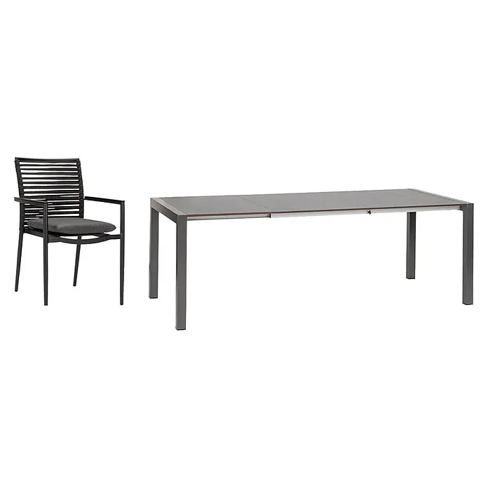 Acamp Gartenmöbel-Set New Jersey/Extensio - 6 -tlg., Aluminium, Acatex, Grau - Schwarzer Metallstuhl mit geflochtener Rückenlehne, Armlehnen und grauem Kissen. Rechteckiger dunkelgrauer Metall-Esstisch mit Ausziehfunktion.