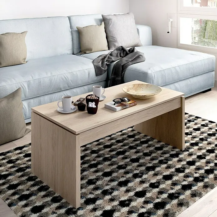 Dekit Mesa auxiliar de jardín Side - L x An x Al: 50 x 100 x 43 cm, Natural - Mesa de centro beige con tazas, cuenco, libro y decoración sobre una alfombra estampada.