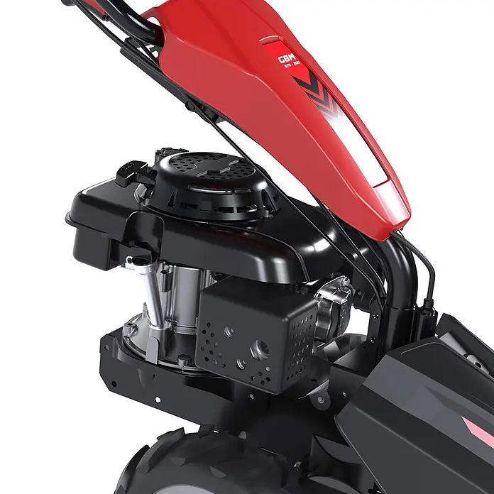 Güde Frontbalkenmäher GBM 870-200 -  - Nahaufnahme des roten und schwarzen Motors und Fahrgestells einer Motorhacke mit Startmechanismus und Kabeln.
