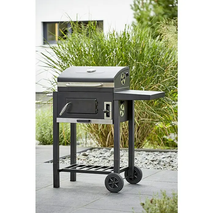 Grillstar Barbacoa de carbón Boston - Superficie de la parrilla (An x Pr): 45 x 32 cm, Negro - Imagen de una barbacoa de carbón negra con estante y ruedas, ideal para fiestas en el jardín y barbacoas al aire libre.