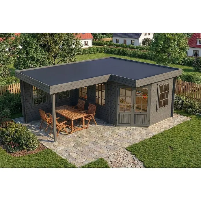 Alpholz Gartenhaus ECO Set Pepe grau - Außenmaß inkl. Dachüberstand (B x T): 618 x 462 cm, Holz, Grau - Dunkelgraues Holzgartenhaus mit schwarzem Flachdach und integrierter überdachter Terrasse, auf einem gepflasterten Bereich mit Holzesstisch.