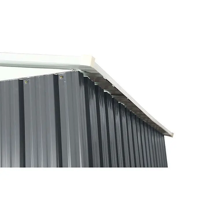Home Deluxe Gerätehaus BOHIO M (B x L x H) 195 x 121 x 180 cm - Außenbreite inkl. Dachüberstand: 195 cm, Außentiefe inkl. Dachüberstand: 121 cm, Stahl, Anthrazit - Nahaufnahme der dunkelgrauen Wellblechwand eines Schuppens mit weißem Dachüberstand.