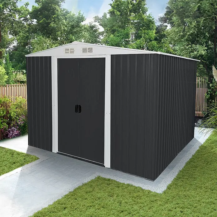 Home Deluxe Gerätehaus BOHIO XXL (B x L x H) 257 x 313 x 178 cm - Außenbreite inkl. Dachüberstand: 257 cm, Außentiefe inkl. Dachüberstand: 313 cm, Stahl, Anthrazit - Ein dunkelgraues Gartenhaus aus Wellblech mit hellgrauem Dach und Türrahmen auf einem gepflasterten Bereich.