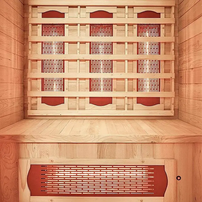 HOME DELUXE - Infrarotkabine mit Vollspektrumstrahler REDSUN M - 120 x 105 cm für 2 Personen -  - Infrarotsauna-Innenraum mit hellen Holzpaneelen und mehreren leuchtenden roten Infrarot-Heizelementen hinter Holzgittern.
