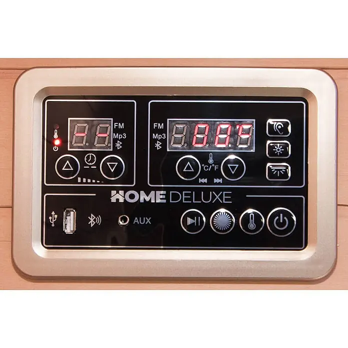 Home Deluxe Infrarotkabine SAHARA XXL -  - HOME DELUXE Bedienfeld mit Digitalanzeigen, Mediensteuerung und USB/AUX-Anschlüssen, auf Holzwand montiert.