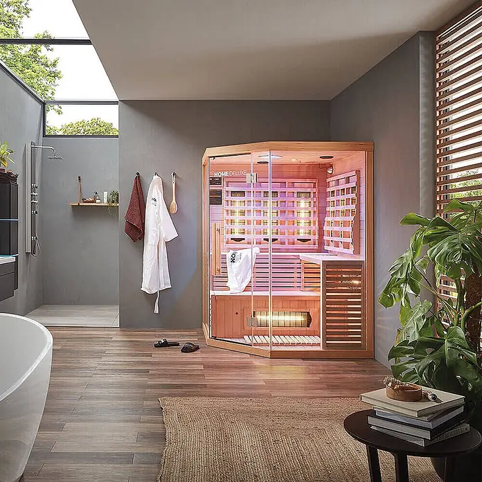 Home Deluxe Infrarotkabine SAHARA XXL -  - Infrarot-Saunakabine aus Holz und Glas mit warmem Licht, in einem modernen Badezimmer für Zuhause.