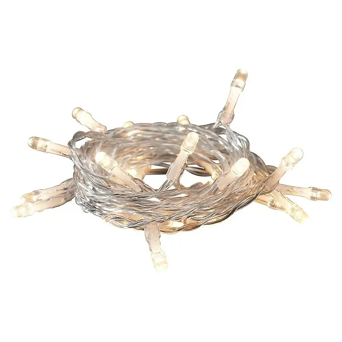 Konstsmide LED-Lichterkette - Innen, Lichtfarbe: Warmweiß, Anzahl Leuchtmittel: 20 Stk., Batteriebetrieben, Klar - Aufnahme einer zusammengerollten Lichterkette mit klarem Kabel und warmweißen LED-Leuchten auf einem schwarzen Hintergrund.
