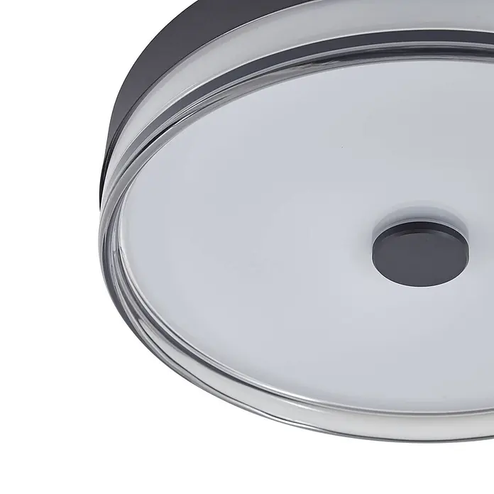 Lindby Deckenleuchte Aldorin - schwarz - Nahaufnahme einer modernen runden LED-Deckenleuchte mit dunkelgrauem Rahmen, klarem Akzent und mattweißer Abdeckung.