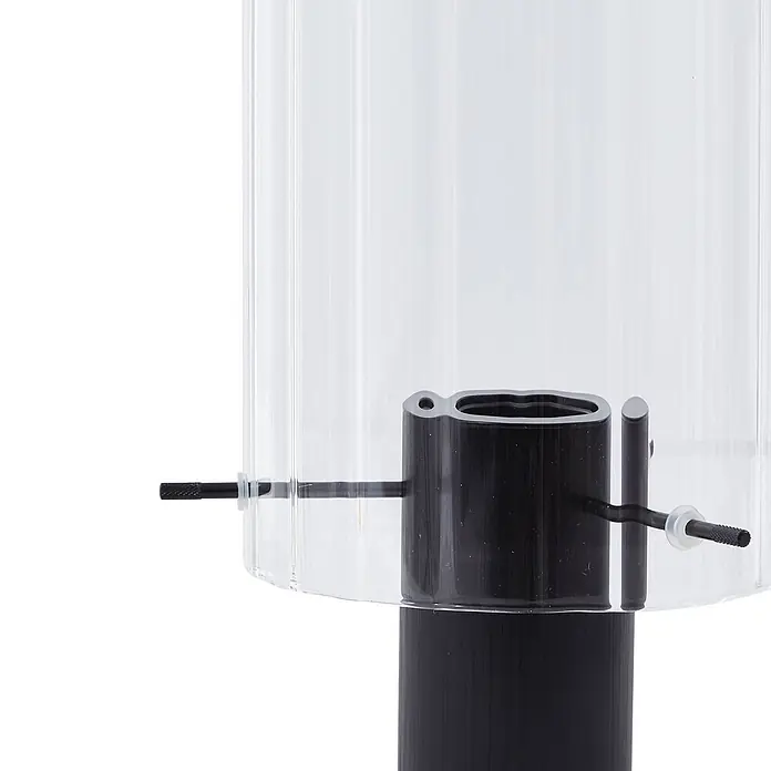 Lucande Tischleuchte Eirian - schwarz, klar / transparent, E27 - Transparente Vogelfutterstation mit schwarzer Futteröffnung und schwarzen Sitzstangen.