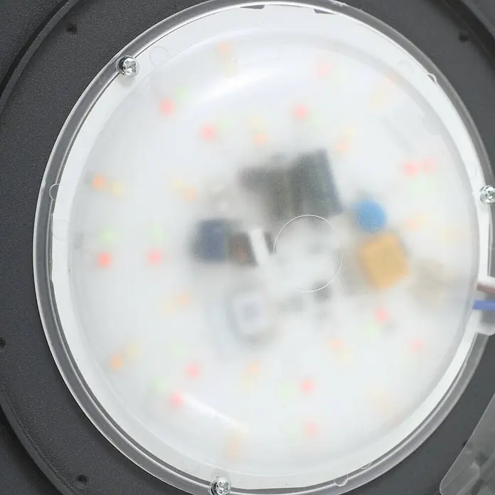 Lindby Außenwandleuchte Liren - alu / grau / zink, IP54 - Runde LED-Platte mit matter Abdeckung, zeigt LEDs und interne Elektronik, in dunklem Gehäuse gesichert.