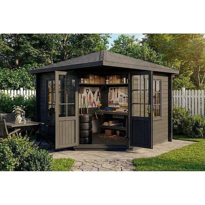 Alpholz Gartenhaus Monica - Außenmaß inkl. Dachüberstand (B x T): 320 x 320 cm, Holz, Grau - Dunkelgrauer Holz-Garten-Werkstattschuppen mit offenen Türen, der Werkzeuge, eine Werkbank und Reifen zeigt, in einem grünen Garten neben einem Terrassentisch.