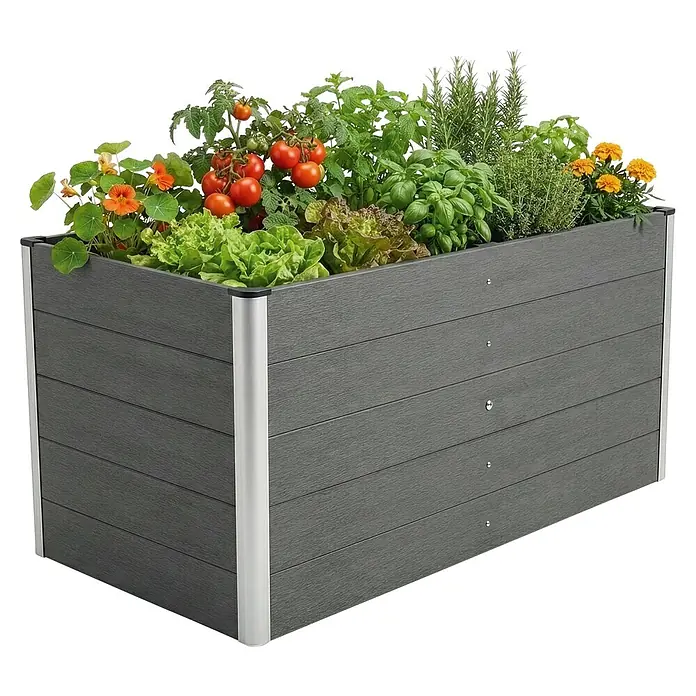 Floordirekt Hochbeet Delos - 150 x 70 x 75 cm, WPC, Anthrazit - Dunkelgraues Hochbeet aus WPC mit silbernen Eckprofilen, bepflanzt mit Tomaten, Salat und Kräutern.