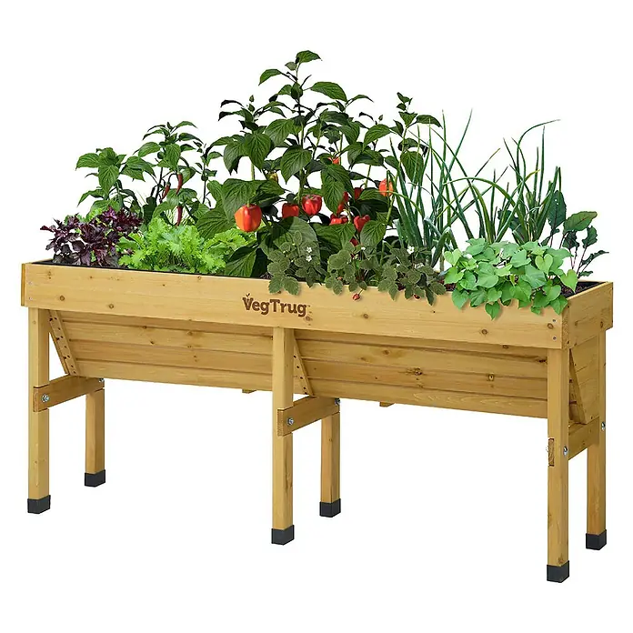 VegTrug Hochbeet Wall Hugger - Holz, Natur - Naturfarbenes, V-förmiges Hochbeet aus Holz, gefüllt mit verschiedenen Pflanzen und roten Paprika.