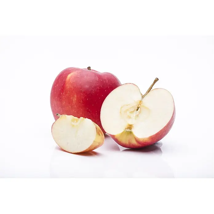 Pflanzen für dich Obstbaum 40 cm - Malus domestica - Rote Äpfel: ein ganzer, eine Hälfte und eine Scheibe.