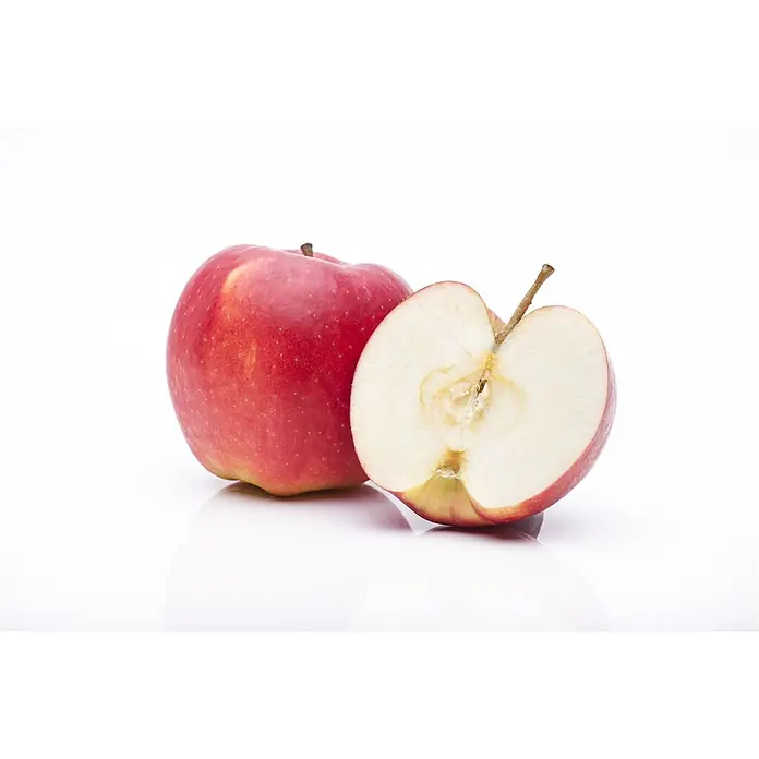 Pflanzen für dich Obstbaum 150-200cm - Malus domestica 'Jonagold' - Zwei rote Äpfel, einer ganz und einer halbiert, der das weiße Fruchtfleisch und Kerngehäuse zeigt.