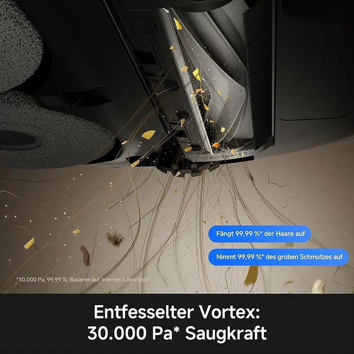 Mova Saugwischroboter P70 Pro Ultra - Saugkraft: 30.000 Pa, Akkulaufzeit: 130 min - 250 min - Unterseite eines dunklen Staubsaugers saugt Haare, Krümel und Schmutz vom hellbraunen Boden auf.