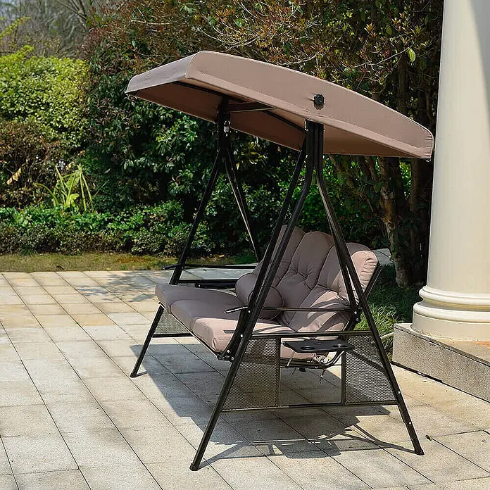 Home Deluxe Garten-Schaukelstuhl Hollywoodschaukel DESCANSO - Beige, B x T x H: 115 x 198 x 195 cm - Zweisitzige Outdoor-Schaukelbank mit schwarzem Metallrahmen, beigem Sonnendach und Polstern, auf einer Terrasse.