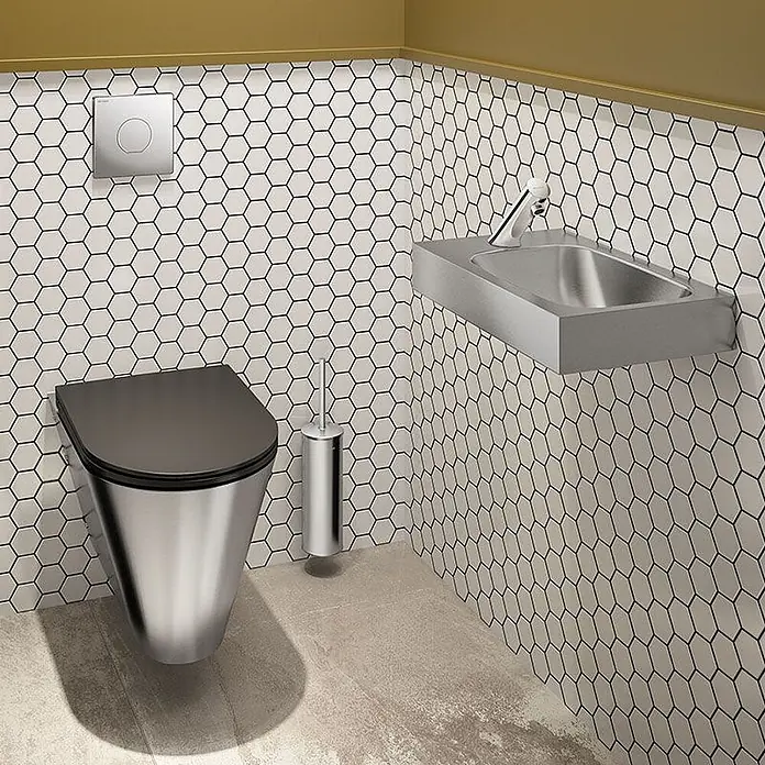 Delabie WC-Sitz - Schwarz - Modernes wandhängendes Edelstahl-WC mit schwarzem Sitz, Toilettenbürste und wandhängendem Edelstahlwaschbecken mit Armatur.