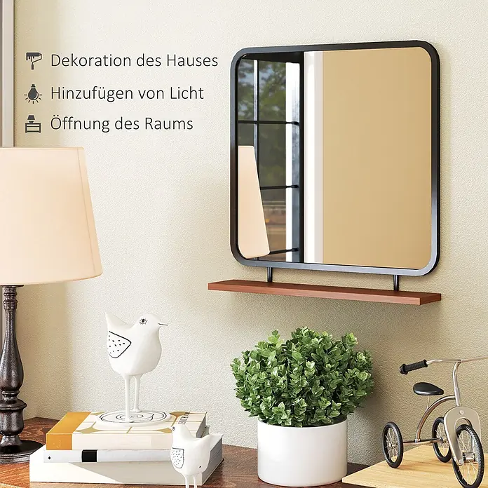 Homcom Wandspiegel - 10 x 55,5 cm - Rechteckiger Spiegel mit schwarzem Rahmen und abgerundeten Ecken, inklusive integrierter Holzablage, an einer strukturierten Wand montiert.