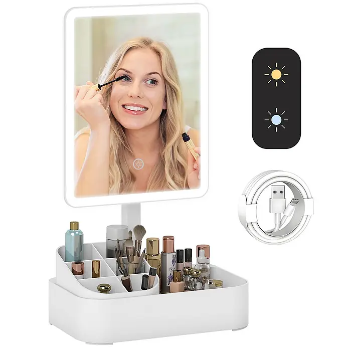 Homcom Kosmetikspiegel LED Schminkspiegel - Weiß - Weißer beleuchteter Schminkspiegel mit Organizer. Eine Frau schminkt sich; Lichtsteuerung und USB-Kabel sind sichtbar.