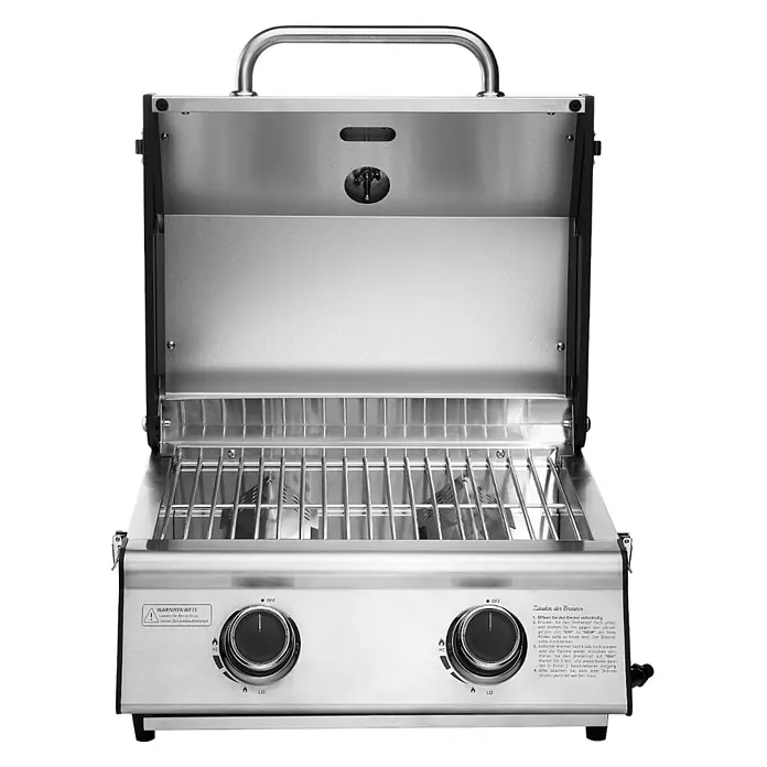 TAINO Gasgrill PLATINUM COMPACT - 2,2 kW, Anzahl Brenner: 2 Stk. - Offener tragbarer Gasgrill aus Edelstahl mit schwarzen Akzenten, der zwei Grillroste und zwei Bedienknöpfe auf der Vorderseite zeigt.