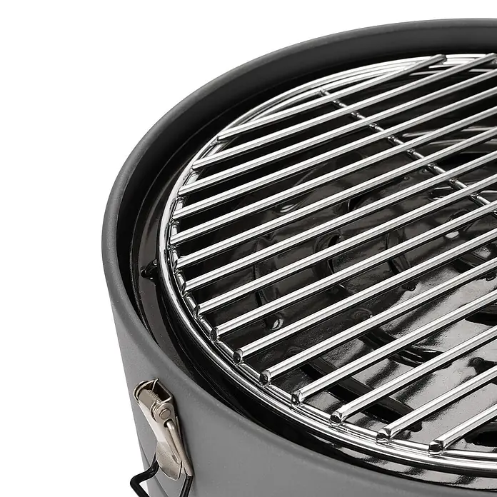 TAINO Gasgrill To-Go - 2,5 kW, Anzahl Brenner: 1 Stk. - Nahaufnahme eines kompakten, dunkelgrauen Holzkohlegrills mit glänzendem verchromtem Grillrost und Seitenverschluss.