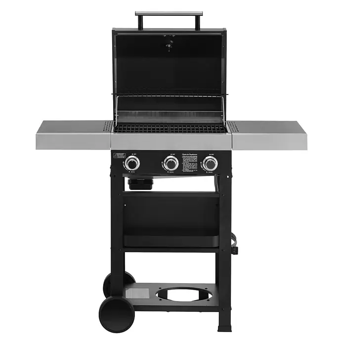 TAINO Gasgrill WABAYA 3+0 - 2,5 kW, Anzahl Brenner: 3 Stk. - Schwarzer und silberner Gasgrill mit geöffnetem Deckel, Rosten und Warmhalterost. Mit Seitenablagen, Bedienknöpfen und Rädern.