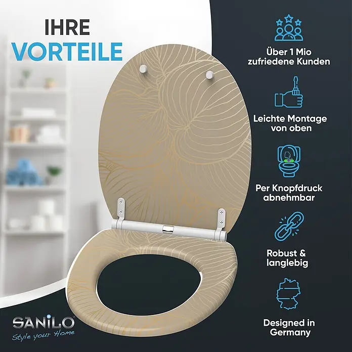 SANILO WC-Sitz Hosta mit Schnellverschluss - MDF, Beige, Mit Absenkautomatik - Geöffneter beiger Toilettensitz mit goldenem Blattmuster auf Deckel und Sitz. Weiße Scharniere sind sichtbar. Produktwerbung.