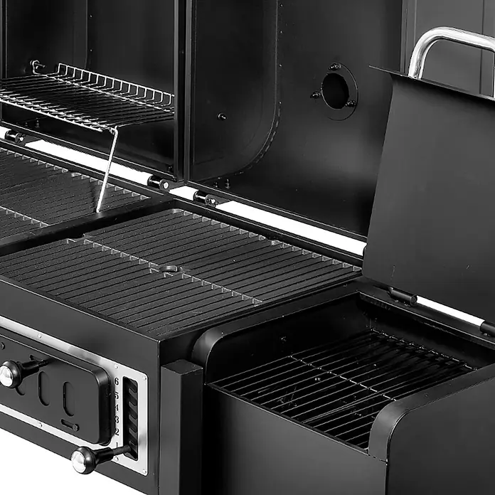 TAINO Holzkohlegrill HERO DUO - Schwarz - Schwarzer Metall-Barbecue-Smoker mit offenen Haupt- und Seitenkammern, zeigt Grillroste, Warmhalterost und Seitenregler.
