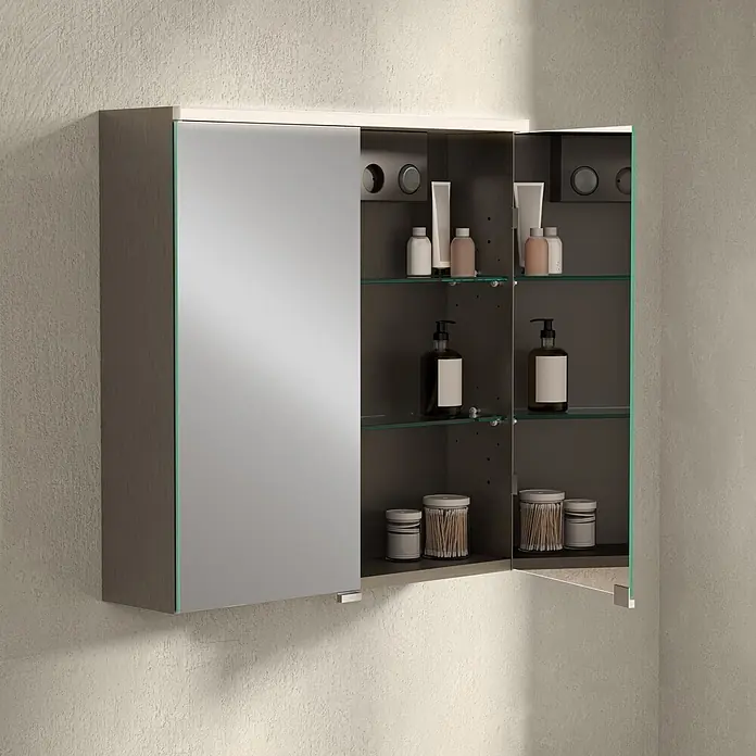 VitrA LED-Spiegelschrank Root/Integra - B x H: 60 x 62 cm, Chrom gebürstet - Wandmontierter Spiegelschrank mit integrierter Beleuchtung und Glasböden, der Toilettenartikel an einer strukturierten Wand aufbewahrt.