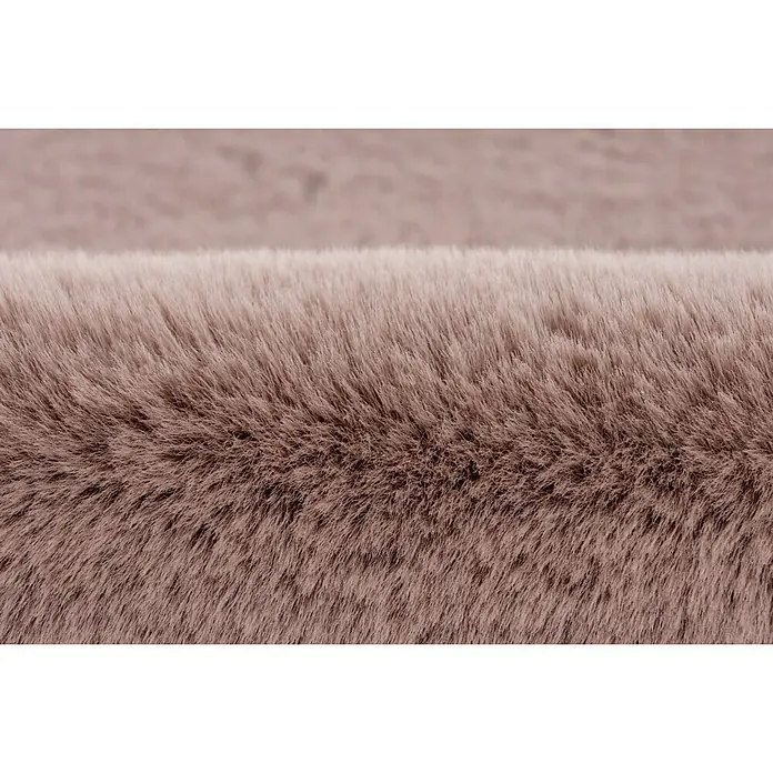 Fellteppich Happy - Rosa, 170 x 120 cm, 100 % Polyester (Flor) - Detailaufnahme eines flauschigen, beigen Teppichs, der Wärme und Komfort ausstrahlt. Die Textur ist weich und einladend.