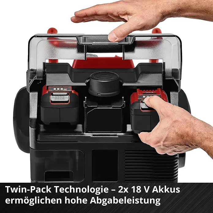 Einhell Power X-Change 18V Akku-Kompressor TE- AC 36/150 Li OF-Solo - 36 V, Ohne Akku, 8 bar - Hände bedienen ein schwarz-rotes Stromgerät, setzen zwei 18V Akkus unter einer transparenten Abdeckung für hohe Leistung ein oder entnehmen sie.