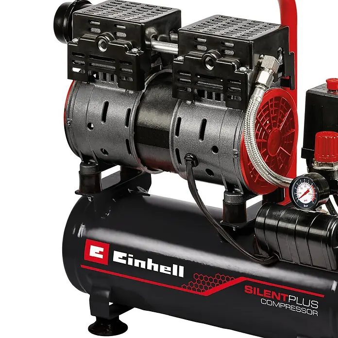 Einhell Expert Plus Flüsterkompressor TE-AC 6 Silent - Max. Druck: 8 bar, 6 l - Nahaufnahme eines schwarz-roten Einhell Silentplus Kompressors mit zwei Motoreinheiten und Manometer.
