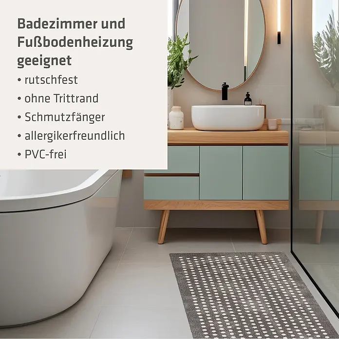 Akzente Fußmatte Feel - 200 x 80 cm, Mehrfarbig, Motiv / Muster - Ein grauer Badteppich mit weißem Punktmuster liegt im Badezimmer auf dem Fliesenboden vor einer Dusche.