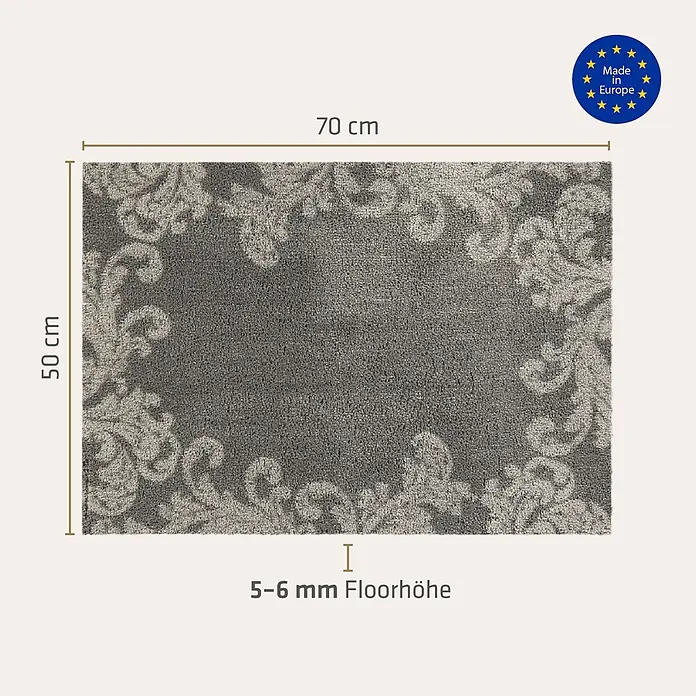 Akzente Fußmatte Feel - Mehrfarbig, Motiv / Muster|Floral - Grauer rechteckiger Teppich mit hellgrauem Blumenrand. Maße 70x50 cm, 5-6 mm Florhöhe. Hergestellt in Europa.