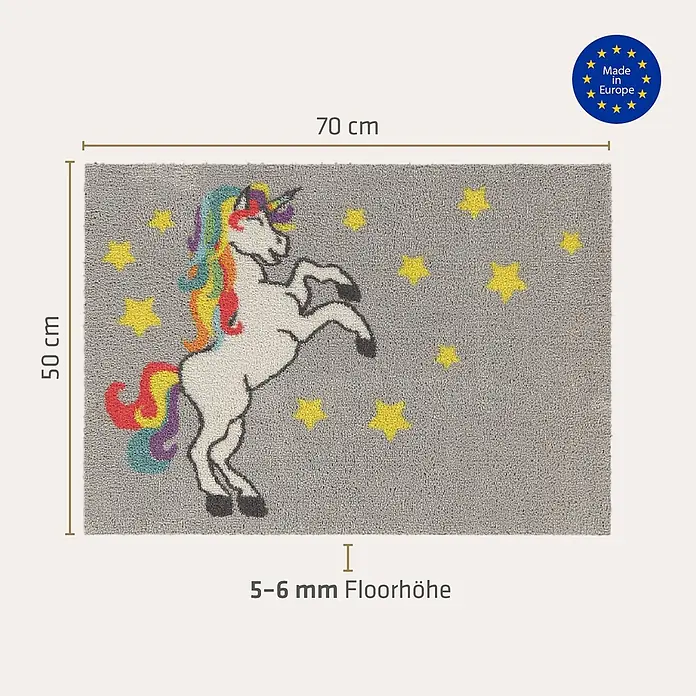 Akzente Fußmatte Feel - Mehrfarbig, Motiv / Muster|Tiere - Grauer Teppich mit weißem Einhorn (Regenbogenmähne/Schweif) und gelben Sternen, 50x70 cm, 5-6 mm Florhöhe.