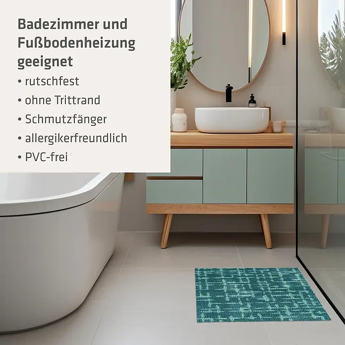 Akzente Fußmatte Feel - Mehrfarbig, Motiv / Muster - Türkisfarbene Badematte mit geometrischem Muster auf dem Badezimmerboden.
