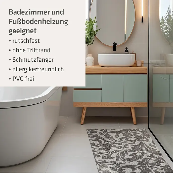 Akzente Fußmatte Feel - Mehrfarbig, Motiv / Muster|Floral - Ein grau-weiß gemusterter Badteppich auf hellem Fliesenboden in einem modernen Bad, rutschfest, schmutzfangend und allergikerfreundlich.