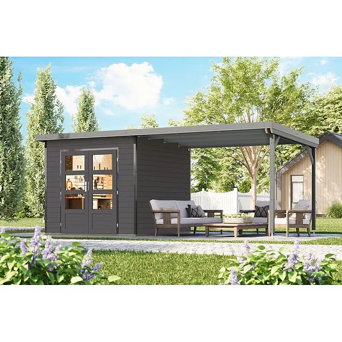 Karibu Gartenhaus Pluto 3 B - Außenmaß inkl. Dachüberstand (B x T): 561 x 266 cm, Holz, Terragrau/Grau - Dunkelgraues Gartenhaus mit angebauter Pergola, die einen Terrassenbereich mit Holzmöbeln überdacht.