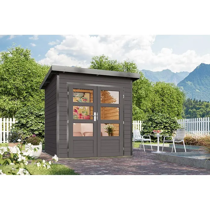 Karibu Gartenhaus Pluto 1 B - Außenmaß inkl. Dachüberstand (B x T): 229 x 228 cm, Holz, Terragrau/Grau - Dunkelgraues Gartenhaus mit Doppelglastüren, eingebettet in eine lebendige Gartenlandschaft.