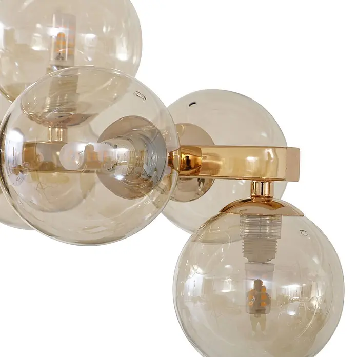 Lucande Pendelleuchte Naelen - L x B x H: 125 x 24,5 x 20 cm, creme / amber, gold, cognac, G9 - Bernstein-Glaskugel-Leuchte mit goldfarbenen Metallakzenten und LED-Lampen.